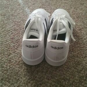 Juniors black and white adidas shoes. Size 4. Girls